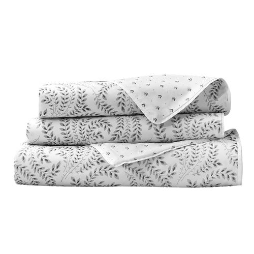Folded grey and white botanical duvet cover set.